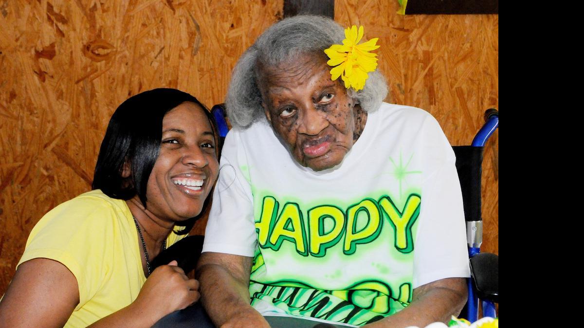 
Willa Moore, with her granddaughter, Denise Moore, celebrates her 108th birthday on May 28 with family and friends. 
