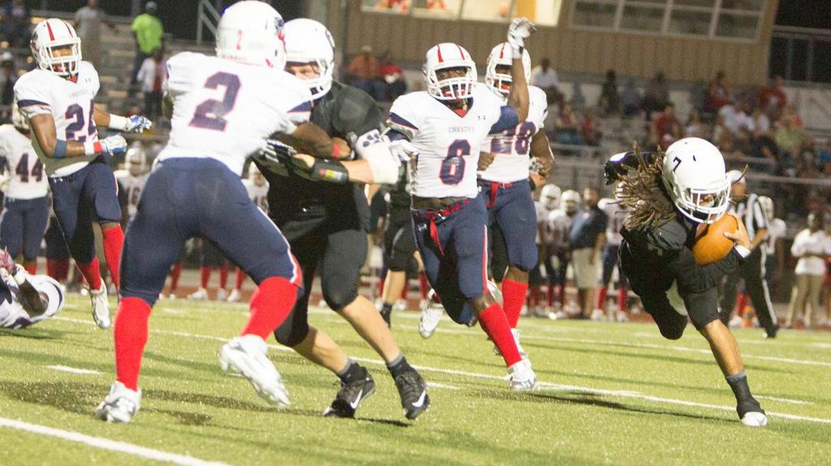 
York’s Wally Wilmore, filling in as quarterback for an injured Cameron McKinney, runs with the ball.
