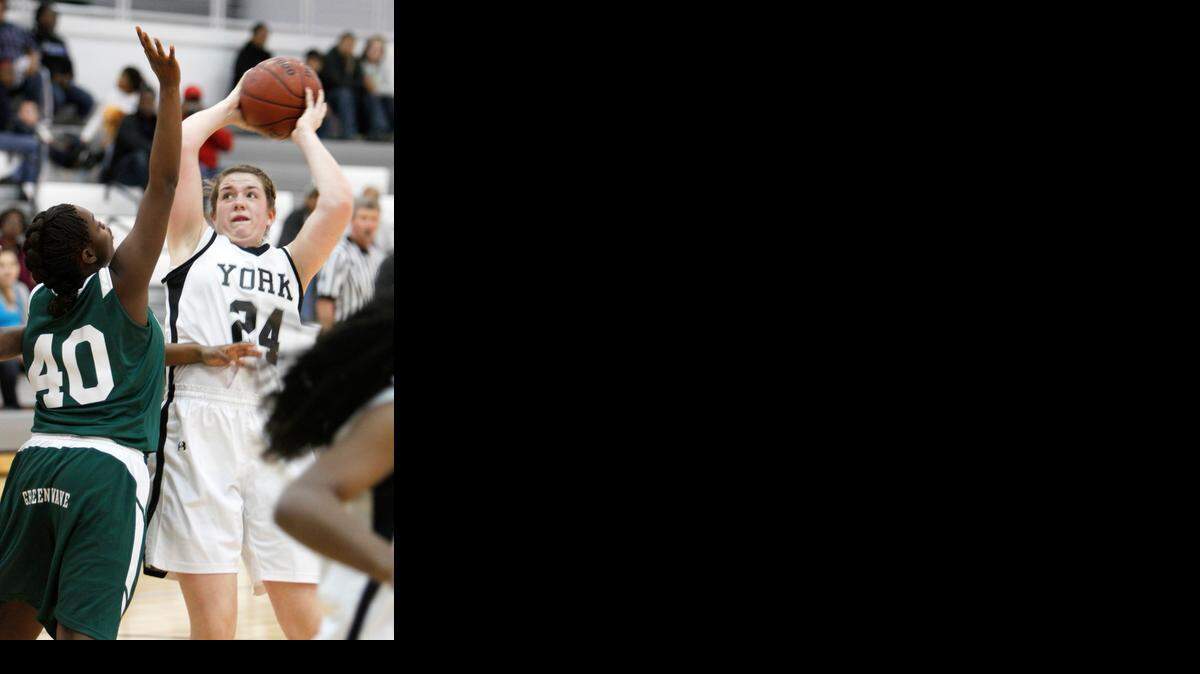 <137>York’s <137>Carrie Lee Lancaster <137>takes a shot. She<137> signed to play basketball in college. <137>with Smith College in Massachusetts<137>.