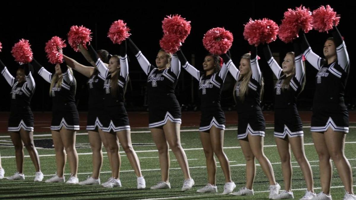 The York Comprehensive High School cheerleaders, at Friday’s game in Fort Mill, have started a competitive cheer team.