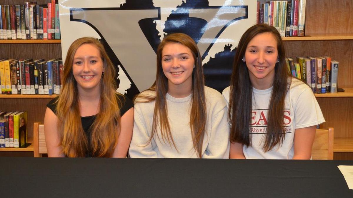 York Comprehensive High School swimmers, from left, Ariel Prescott, Anna Littlejohn and Jessica Myers.