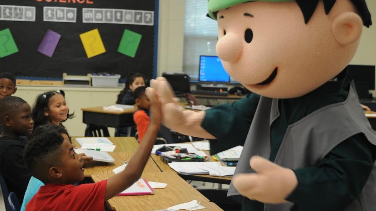 Charlie Brown and Snoopy visit Lewis Baker’s third grade math class Oct. 22 at Steele Creek Elementary School.