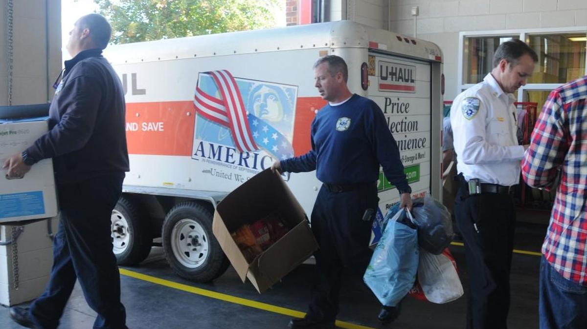 Fort Mill firefighters loaded and delivered supplies to flood victims in South Carolina on Monday.