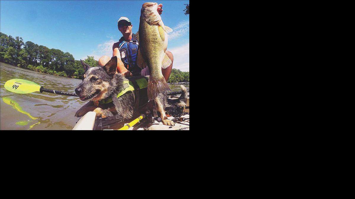 
Drew Gregory, founder of the River Bassin kayak fishing trail, shows off a catch during the 2014 Charlotte regional event.
