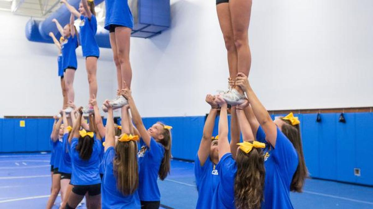 Fort Mill Cheerleaders prepare for the Macy's Thanksgiving Day Parade.