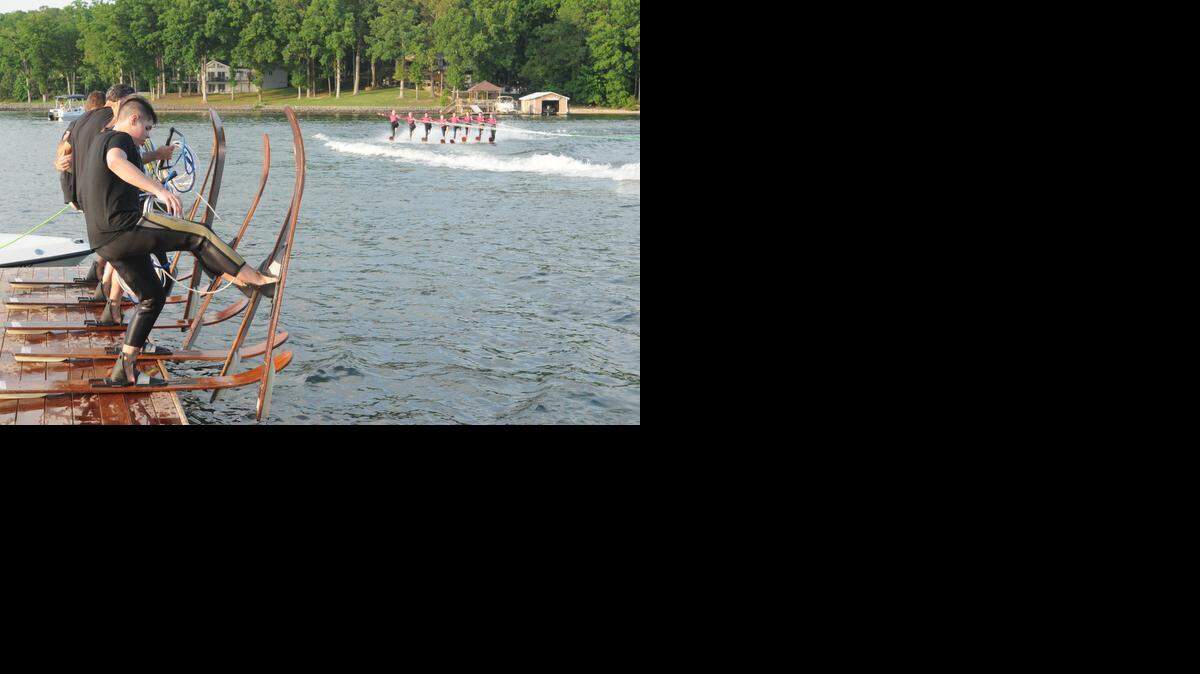 
Members of the Carolina Show Ski Team celebrate their platform with a show in June at Windjammer Park in Tega Cay.
