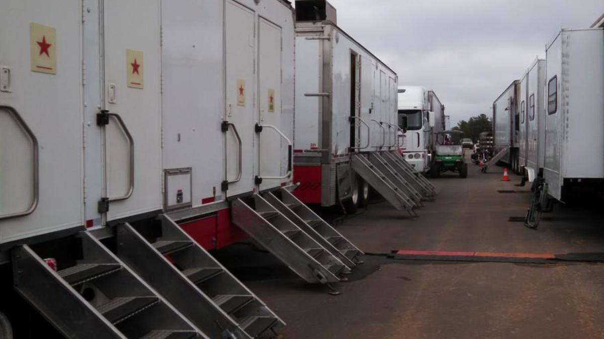 
Trucks and trailers camped on an unfinished portion of the Fort Mill bypass Sept. 20-23, at its Holbrook Road intersection. Crews filmed nearby for “Outcast.” 
