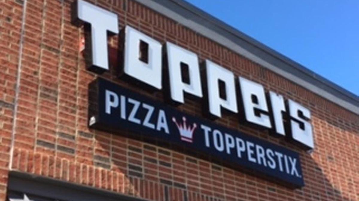 Toppers Pizza opened at the corner of Tom Hall Street and Doby’s Bridge Road recently.