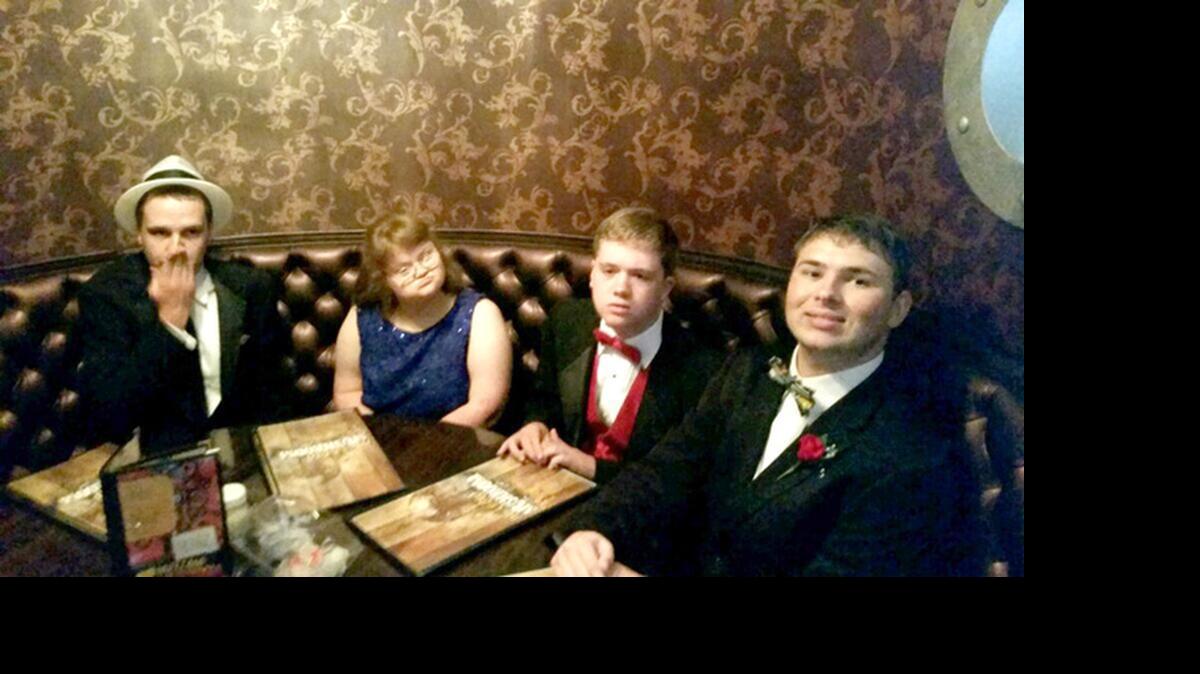 
David Newman, Sarah Zoeller, Alex Brice and Ben Gillam enjoy dinner at Mellow Mushroom before Prom. An anonymous patron paid for their meal.
