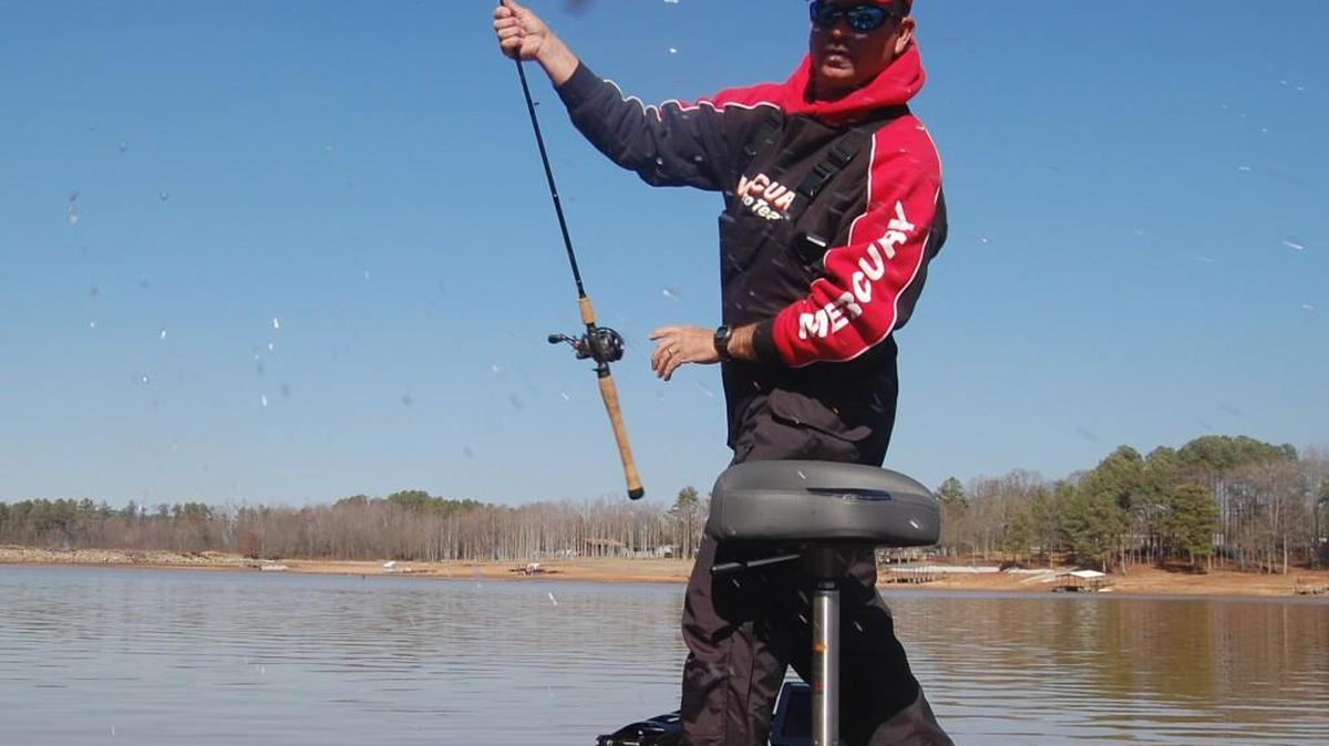 Flying fish for a second, pro angler Todd Auten of Lake Wylie lofts a bass from the water during a Bassmaster Classic competition on South Carolina's Hartwell Lake. BASS announced Wednesday the 2018 Bassmaster Classic will return to Lake Hartwell.