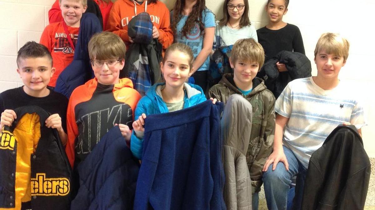 LEO (Young Lions) Club members from Oakridge Middle School collected 60 coats to give to local churches.