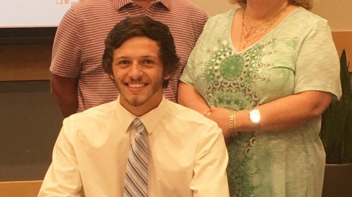 Clover High School graduate Devin Pierzinski with his father and monther, Darryl and Shelly Pierzinski, has been selected for The Apprenticeship 2000 Program.