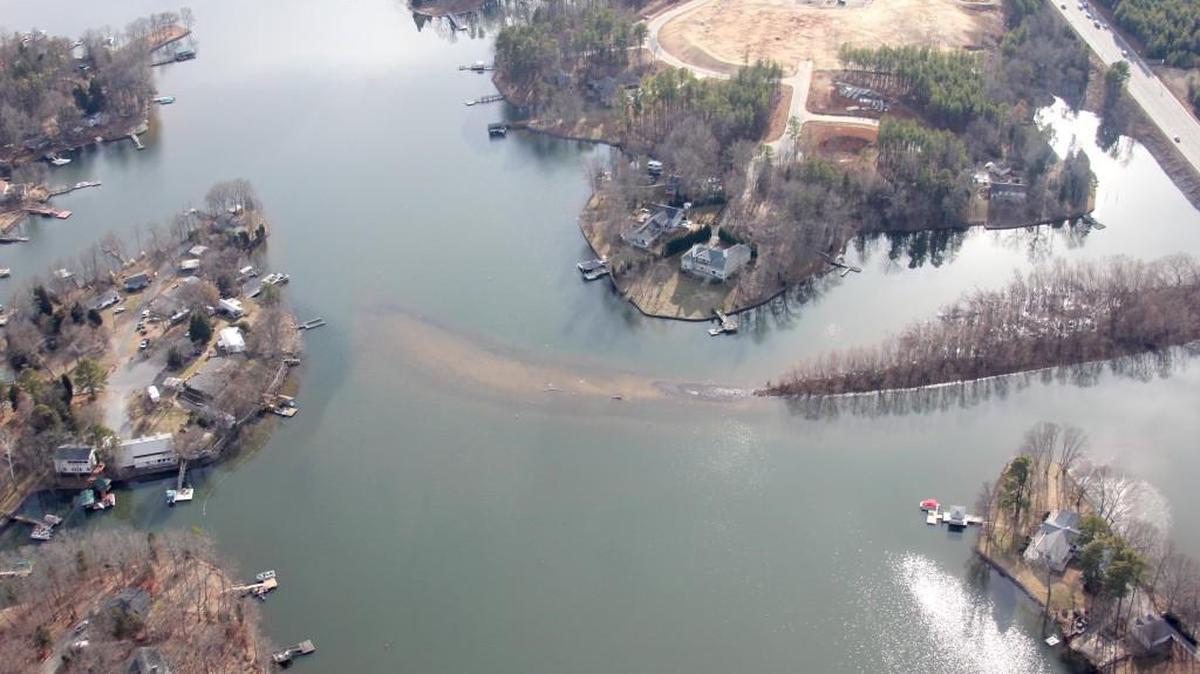 Jim Schaefer and Ken Maddie of Vantage Point Air took these pictures Jan. 23 showing the silt build up in Crowders Creek near the S.C. 49 bridge.