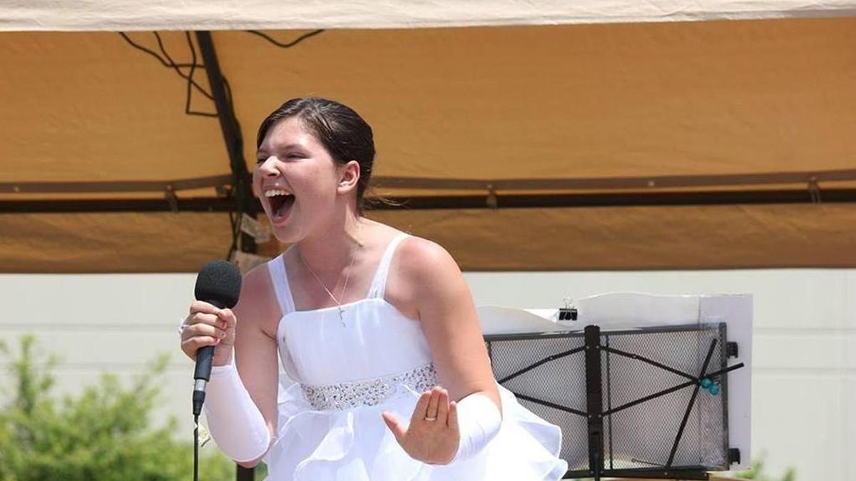Isabella Lebanno, winner in the 7-12 division, performs in the 2015 Italian Idol. The talent showcase is part of the Italian Festival held at St. Philip Neri in Fort Mill.