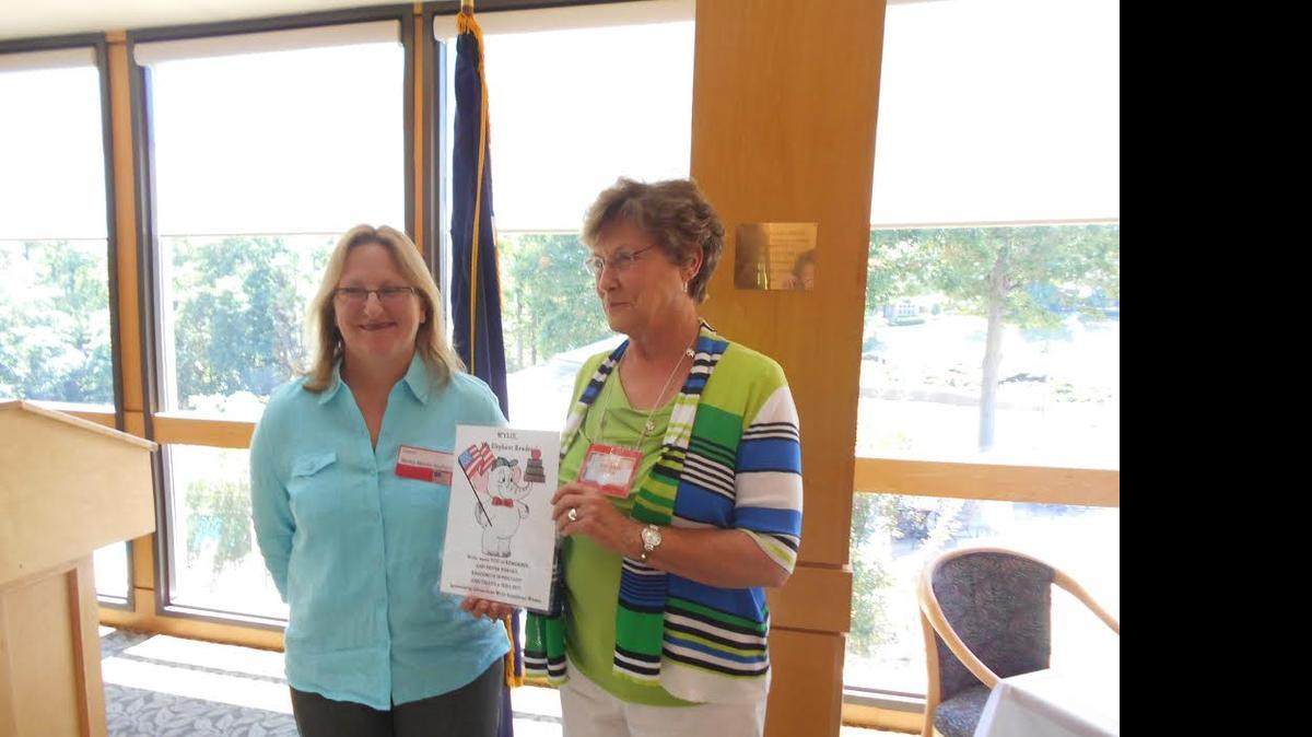 
Clover-Lake Wylie Republican Women's Club member Marianne Falls, right, presents Bagel Boat gift certificates to Nancy Monts-Rayfield, branch manager for Lake Wylie Public Library, during the club’s May luncheon meeting.
