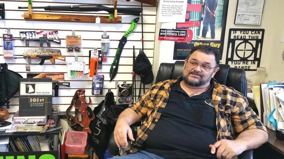 Bruce Eisenmann, owner of The Lone Coyote, discusses the Obama administration's proposed gun control legislation at his store, located inside of The Pony Express on S.C. 21.