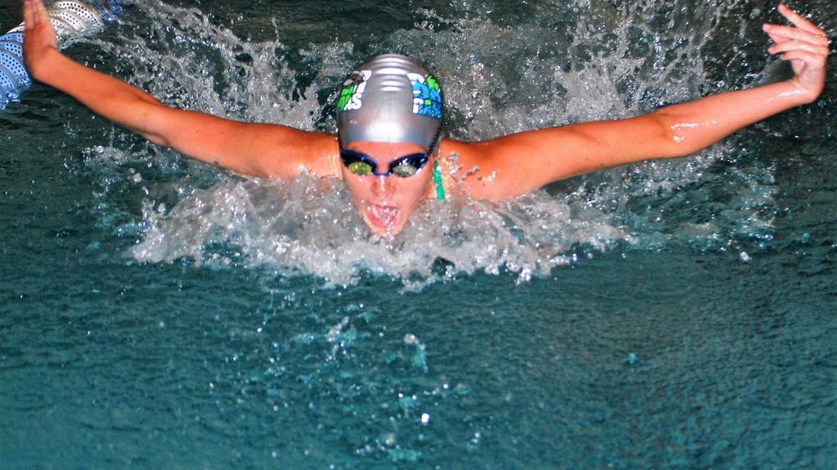 Baxter’s Vivian Knighten swims the butterfly during the Division II All-Star meet.