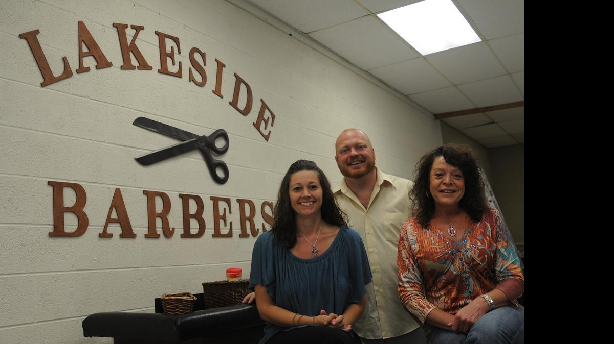 
Shanna Revels, Keith Faulkenberry and Patricia Gittens are three barbers at Lakeside Barbers in Lake Wylie. Stylist Rex Faile also works at the shop.

