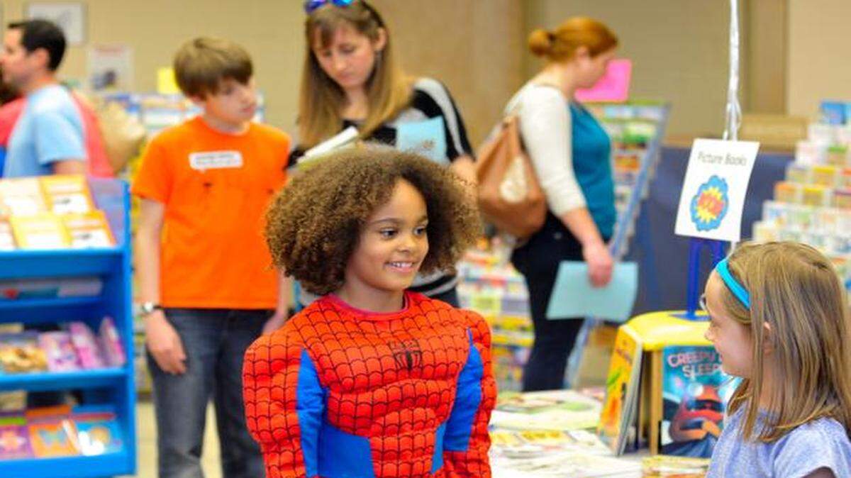 Second-graders check out the selections at book fair held at Riverview Elementary in Fort Mill. School board candidate filing opens Aug. 1 for boards in Fort Mill, Rock Hill, Clover and York school districts.