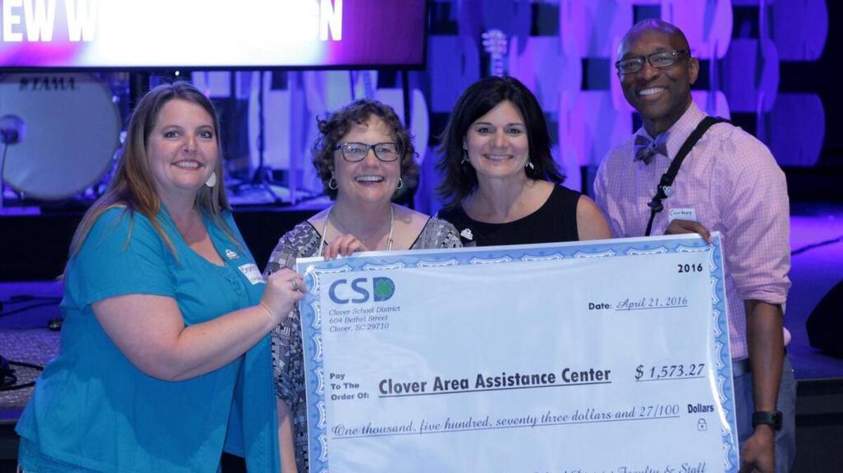 At the close of the Spring session April 21 of Clover Cares, Clover School District social workers Brantlee Spurrier, Natalie Rimmer and Courtney Jones presented Karen van Vierssen, executive director of Clover Area Assistance Center, with a check for $1,573.27. to bring Clover Cares to the community.