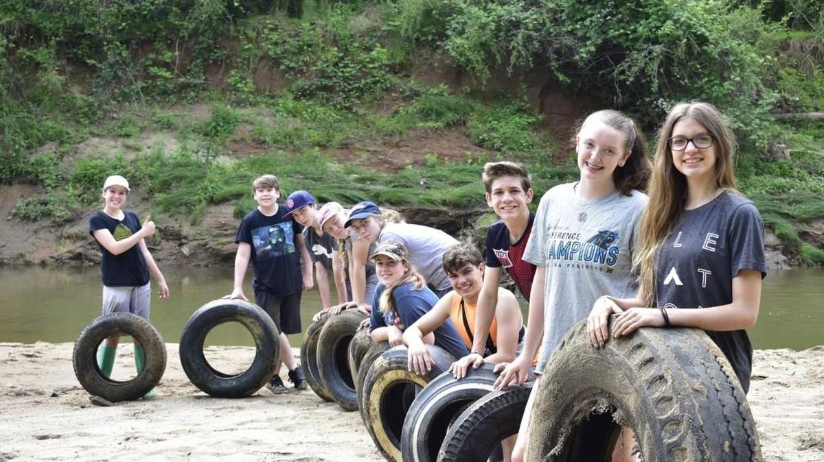 Volunteers helped at two prior clean-ups this year on Sugar Creek, with more planned for Oct. 14.