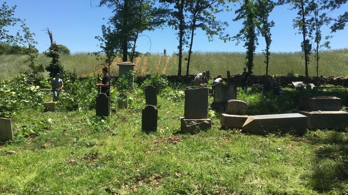 Fort Mill High School ROTC students cleared out Blackstock Cemetery in Fort Mill after years of overgrowth hid many plots.