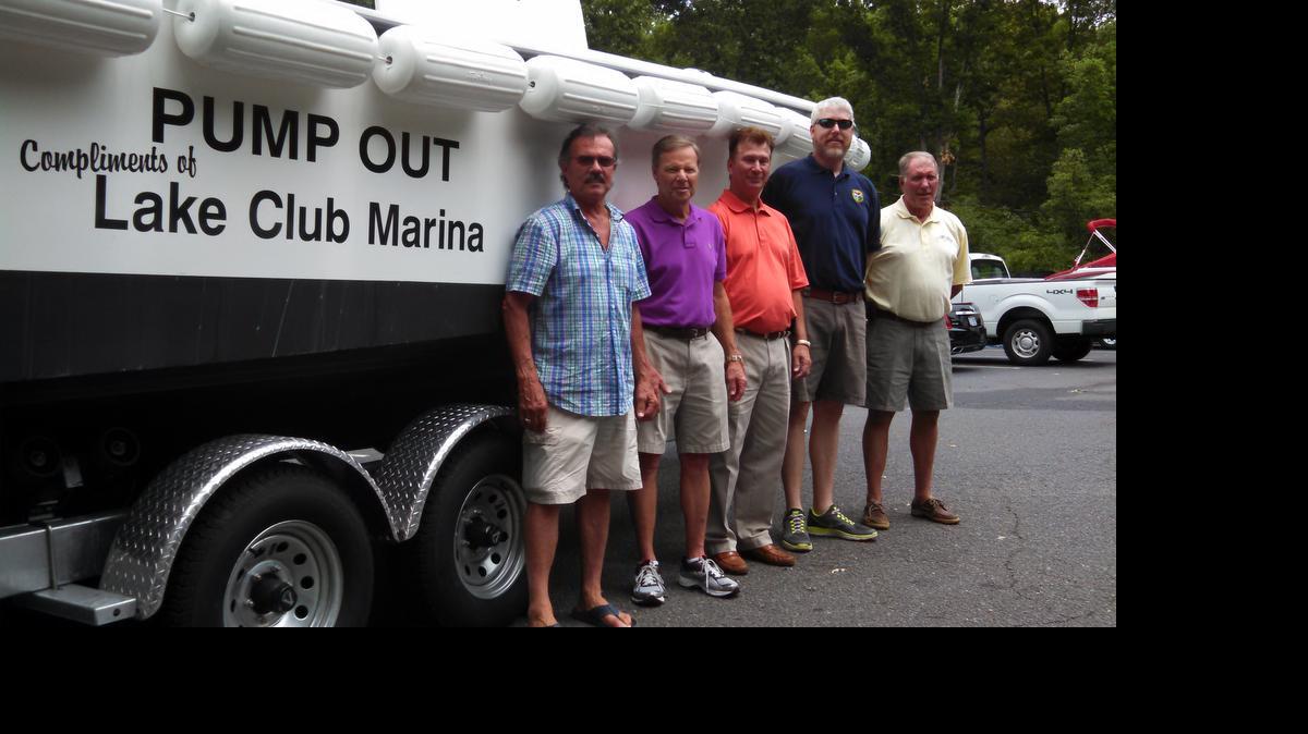 
Representatives from Tega Cay and Lake Club marinas, Duke Energy, South Carolina Department of Natural Resources and the Lake Wylie Marine Commission show off a new boat used to pump out sewage holding tanks on Lake Wylie.
