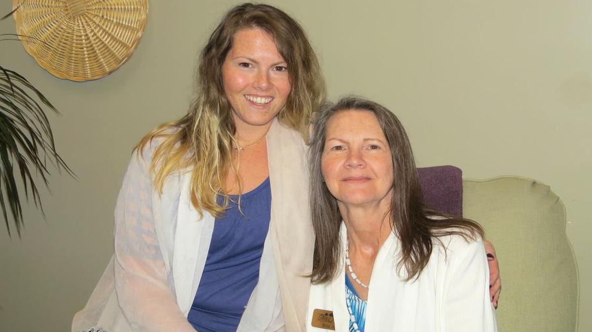 
Rita Alley and her daughter Amanda Dingess at The Ivey Memory Wellness Day Center in SouthPark. Alley, who was diagnosed with early on-set Alzheimer’s, splits her time between Dingess’ home in Rock Hill and her son’s home in Fort Mill and spends her days at The Ivey.
