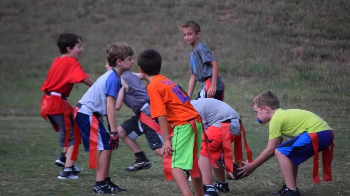 Players practice last week in the Tega Cay flag football league. Tega Cay decided not to sponsor tackle football this year.