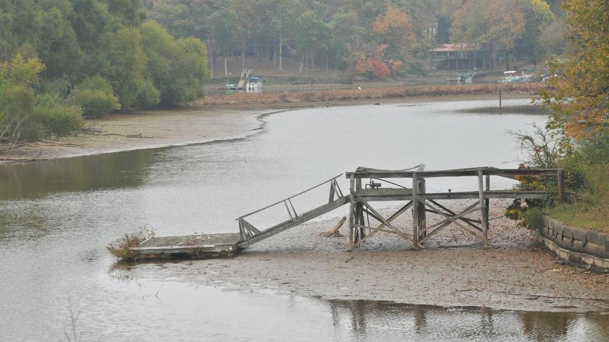 A boat dock sits on the lake bottom due to low water in Crowders Creek on Lake Wylie, one of many areas along the Catawba River Basin impacted by worsening drought conditions.