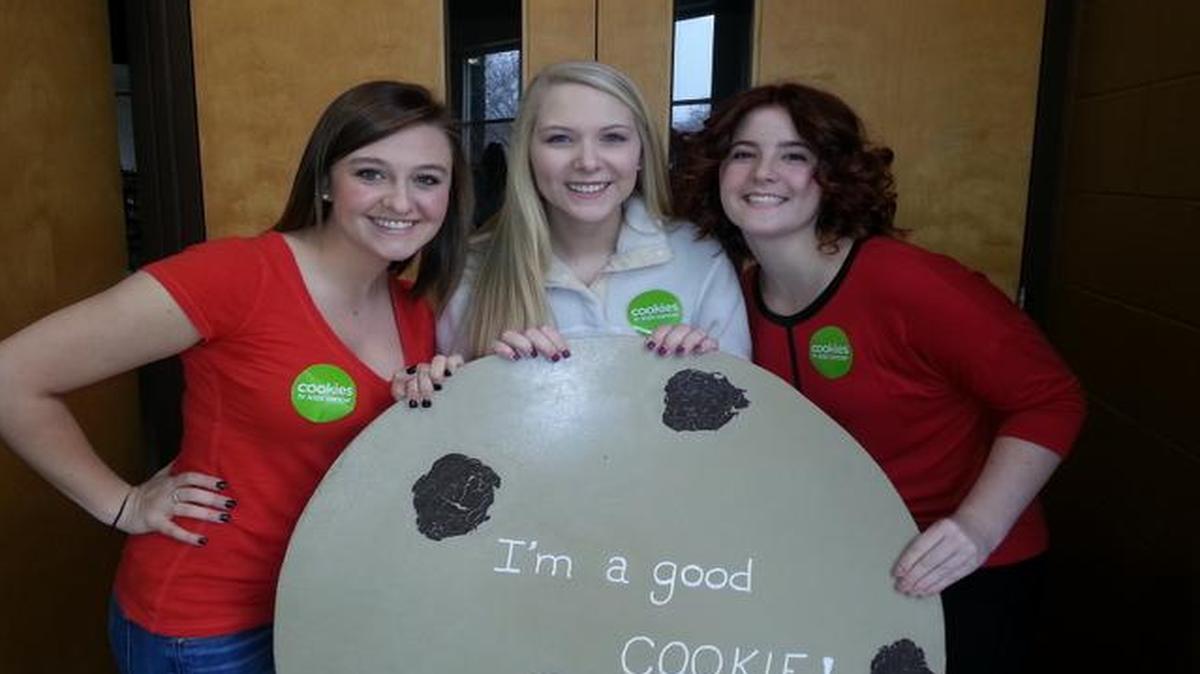 
South Carolina Strawberry Festival pageant contestants from left, Bryana Gose, 20, Alexandra Cook, 15, and Madison Coley, 19, volunteer at a bake sale for Cookies for Kids’ Cancer held at the For Every Season Consignment Sale at The Pointe arena.
