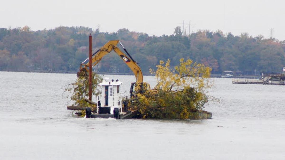 Dumping debris into Lake Wylie requires permission of Duke Energy.