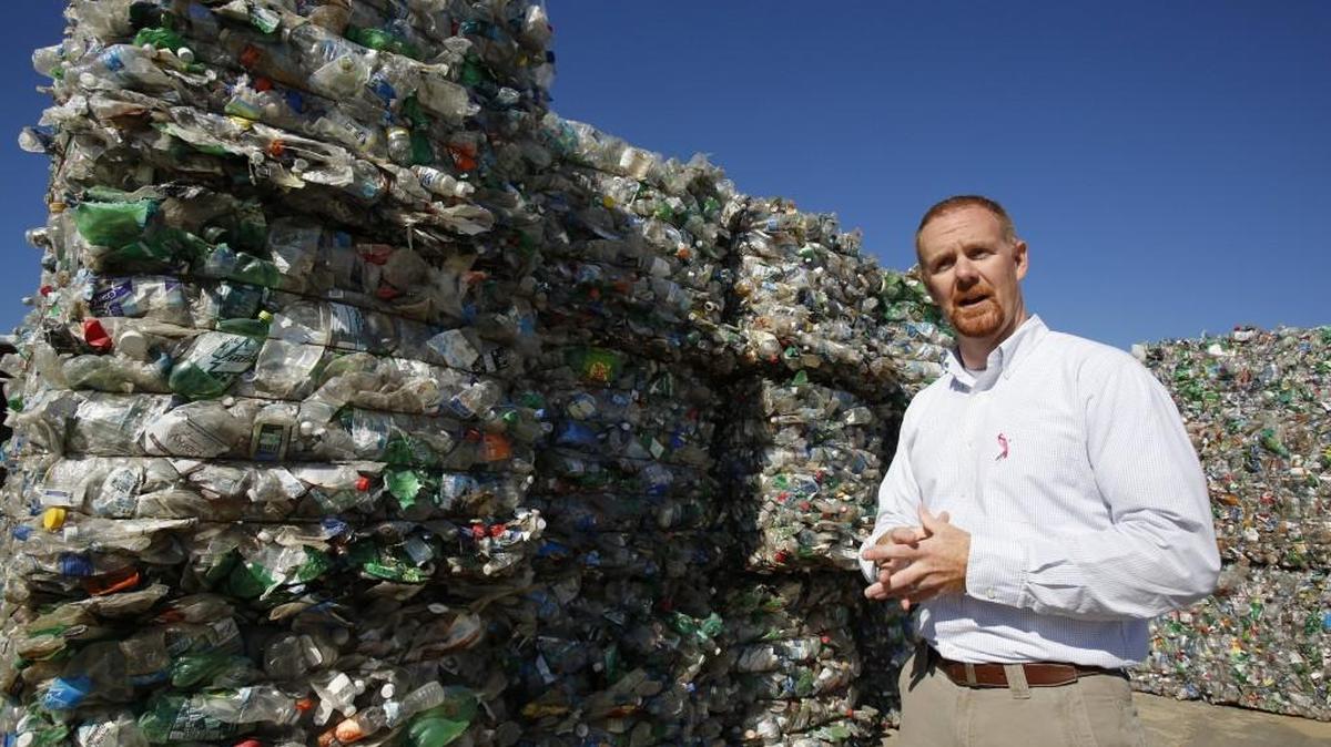 Eric Rekitt, York County assistant public works director, stands next to bales of plastic soda bottles at The York County Public Works Recycling Center in York. Estimates for when a new permanent site in Fort Mill will be ready vary.