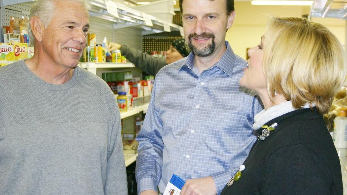 Discussing this year’s Reverse Advent Calendar food drive are Dennis Williams, left, vice chairman of the CAAC board; Douglass Key, pastor of Clover Presbyterian Church; and Gayle Montgomery, pastor of River Hills Community Church.