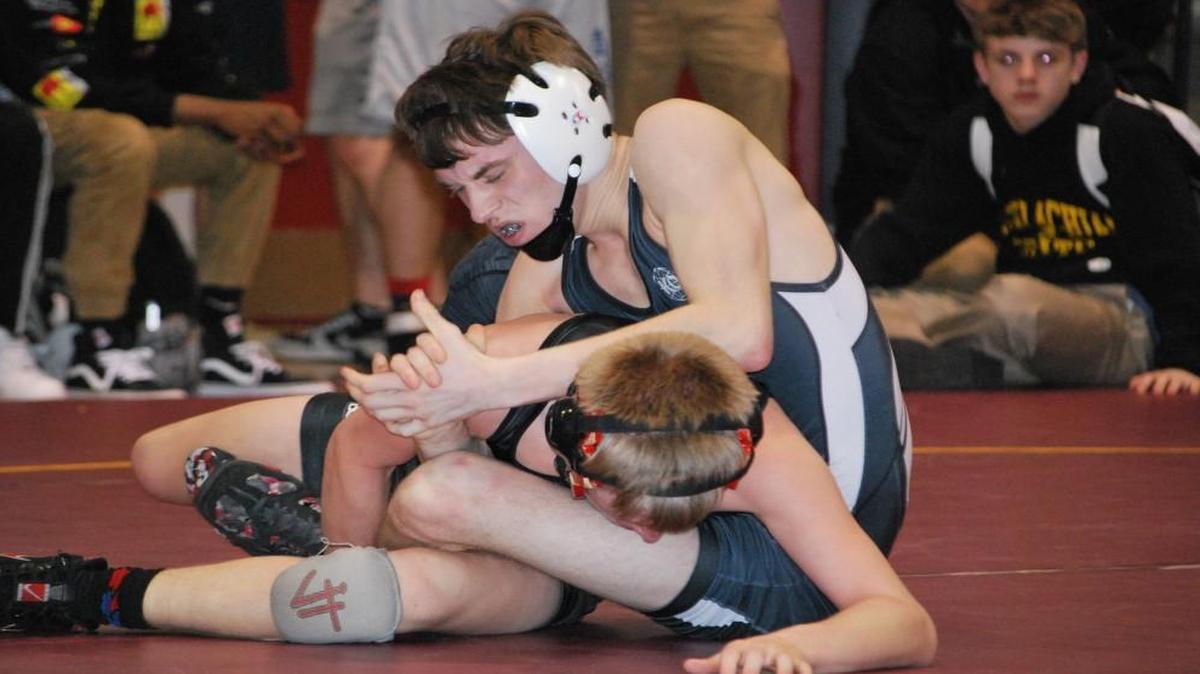 Nation Ford’s Jeremy Kishbaugh wrestles in the final of the 106 pound weight class.