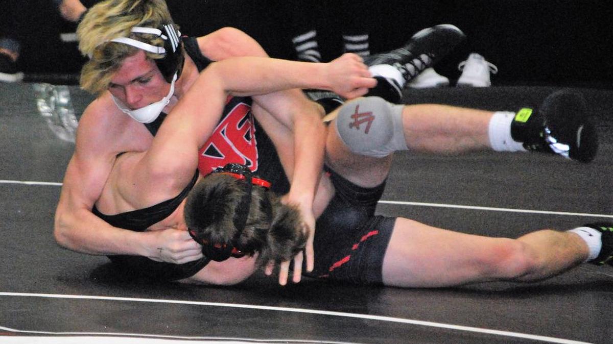 Nation Ford’s Jacob Moore turns his Boiling Springs opponent during a recent dual.