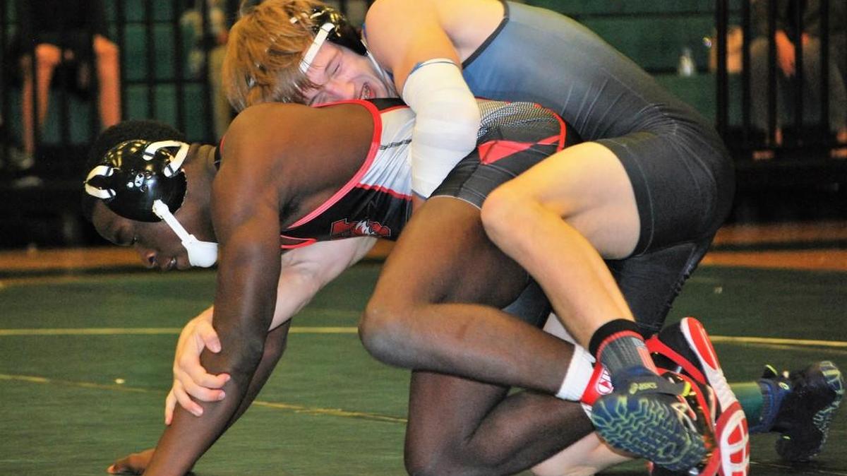 Josh Cizmadia (top) controls his opponent on the way to a win at 152 pounds.