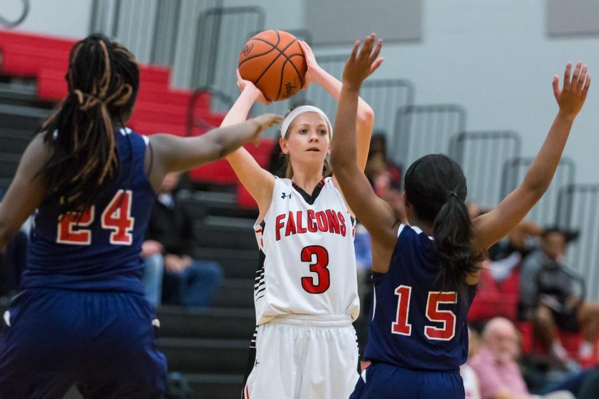 Nation Ford’s Kelci Adams look to pass while Chester defenders close in. Nation Ford ran away with the win Friday.