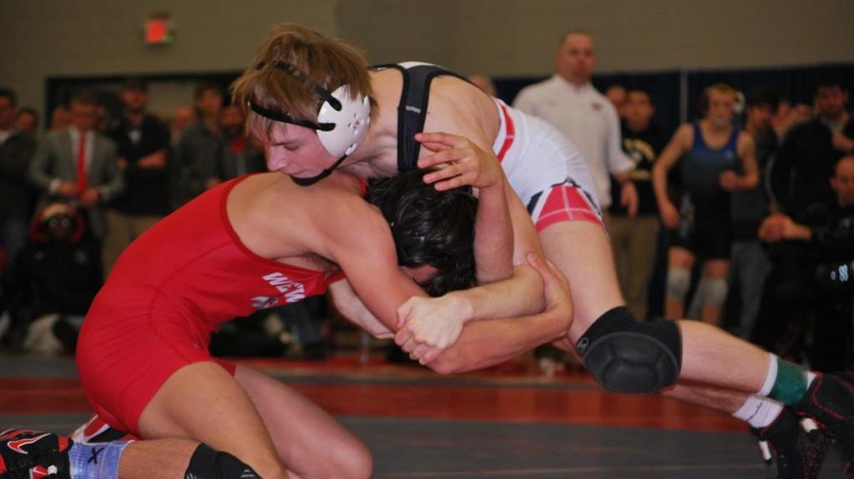 Nation Ford’s Dalen Byerley wrestles Westwood’s Evan Carrigan in the 132-pound finals Saturday.