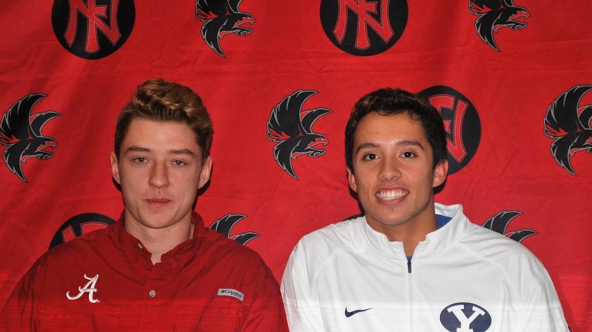 Nation Ford seniors Skyler DeLong, left, and Ben Tuipulotu signed to play Division I college football as part of the early signing day Dec.20.