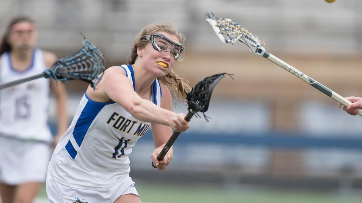 Fort Mill's Charlotte Anderson (11) takes the shot as Fort Mill hosts Lake Norman in girls varsity lacrosse Saturday.