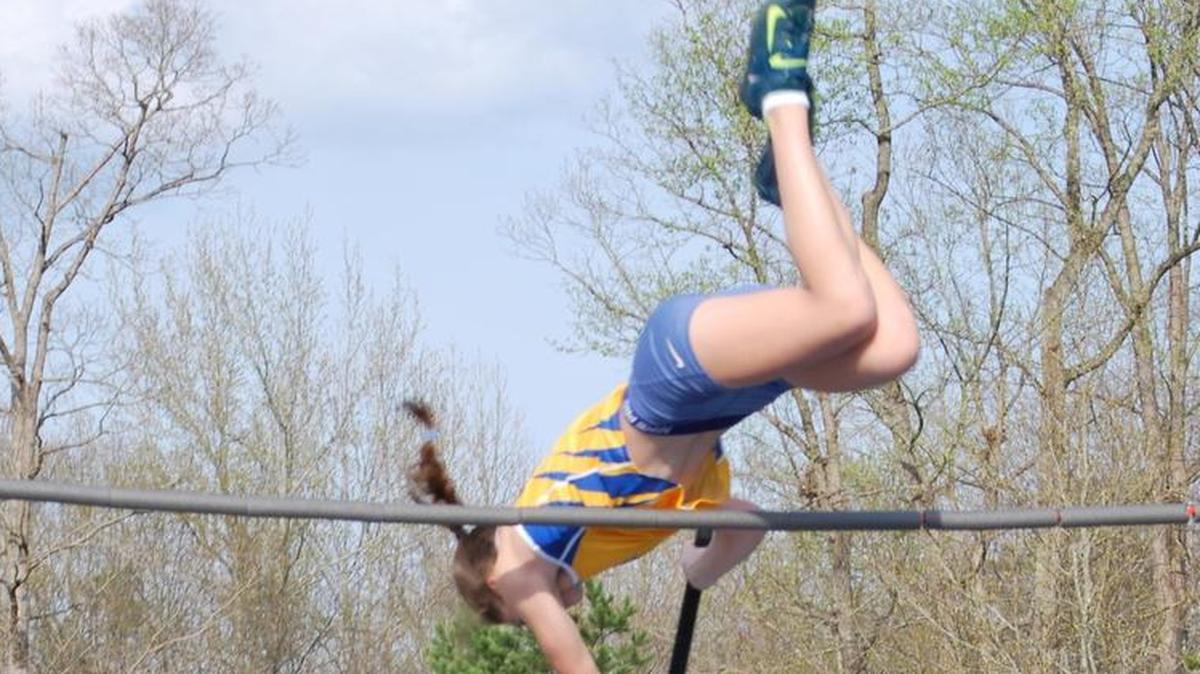 Fort Mill pole vaulter Jessica Brewer sets a school record, clearing 11 feet in the event last week.