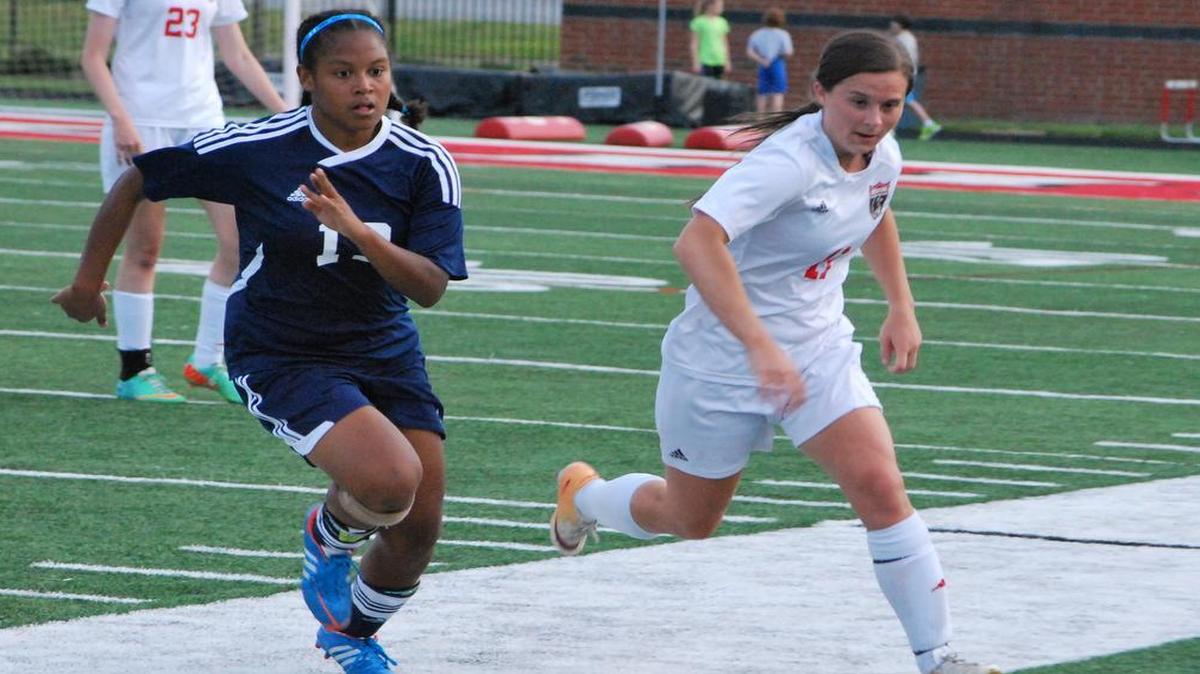 
Nation Ford’s Brooke Ward chases down a loose ball during the Lady Falcons’ loss against Clover.

