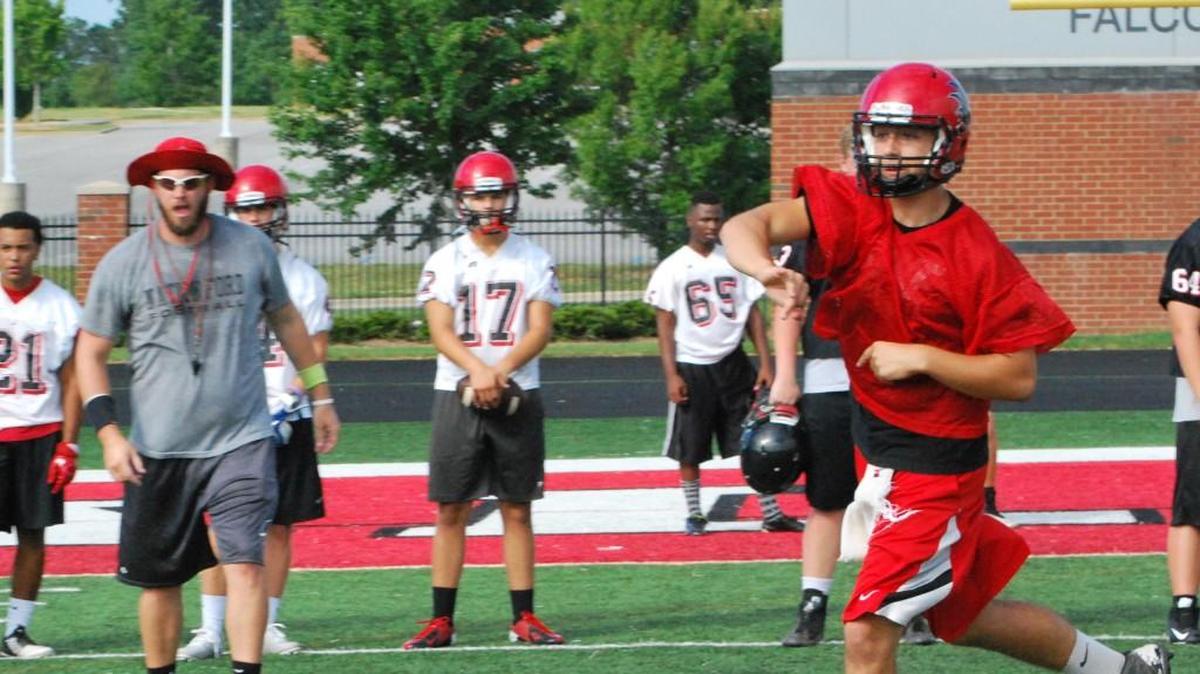 Nation Ford senior quarterback Kirk Rygol throws a pass during practice last week.