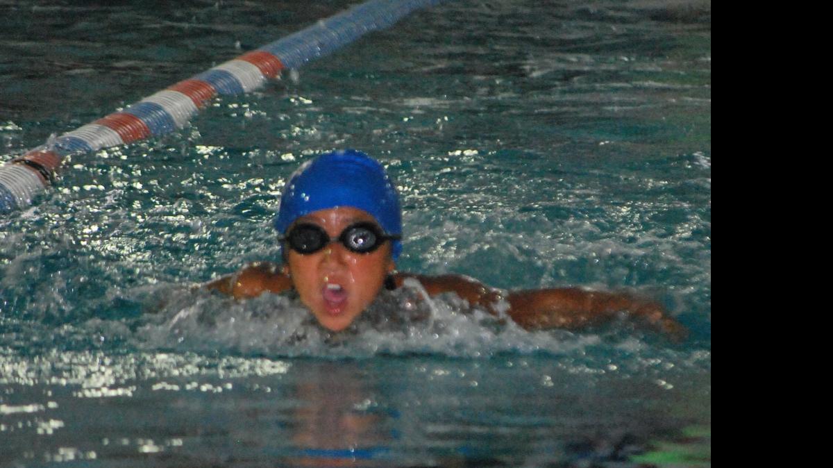 
Celina Vu swims for the Fort Mill Sharks, which won the Greater Charlotte Swim League Division V All-Star meet.
