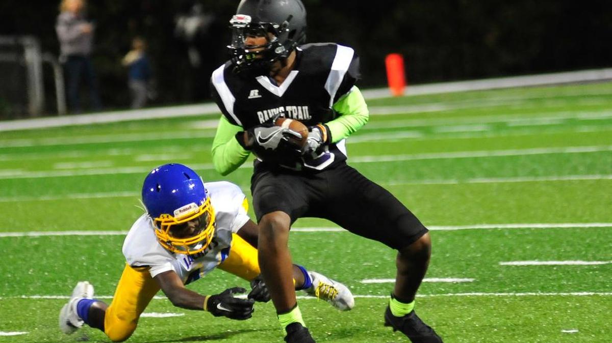 Banks Trail Middle School eighth grader Jacobie Henderson evades Fort Mill Middle's defense when the teams played recently for the Fort Mill Athletic Conference championship. Banks Trail won 8-0.