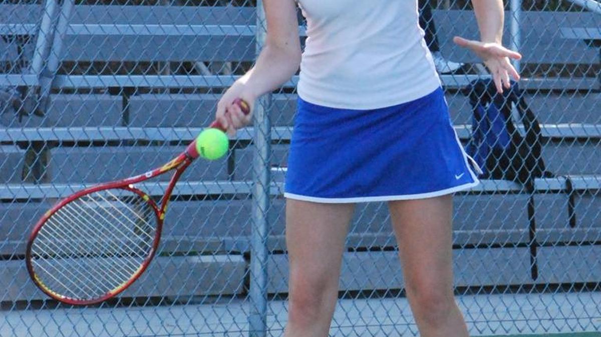 Elizabeth Fitzgerald, who plays No. 1 singles for Fort Mill, returns a ball during her match against Lancaster.