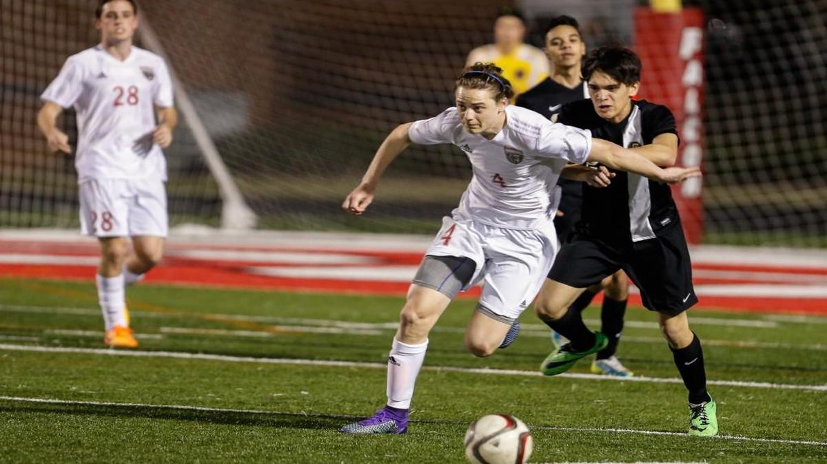 Nation Ford's Jake Cubine (4) breaks downfield with the ball as Nation Ford hosts Gaffney in varsity soccer last Tuesday.