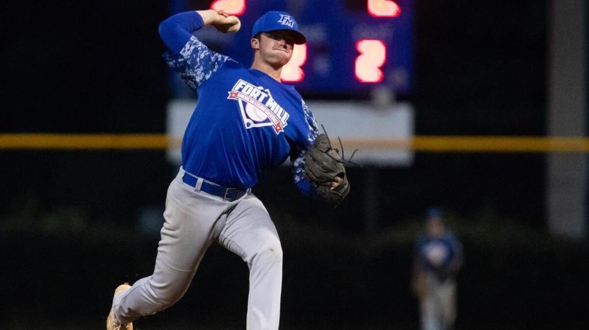 Fort Mill’s #9 Noah Griffin throws a pitch in the 7th inning as Fort Mill Post 43 defeats Spartanburg Post 28 in American Legion playoff baseball Wednesday 7-11-2018.