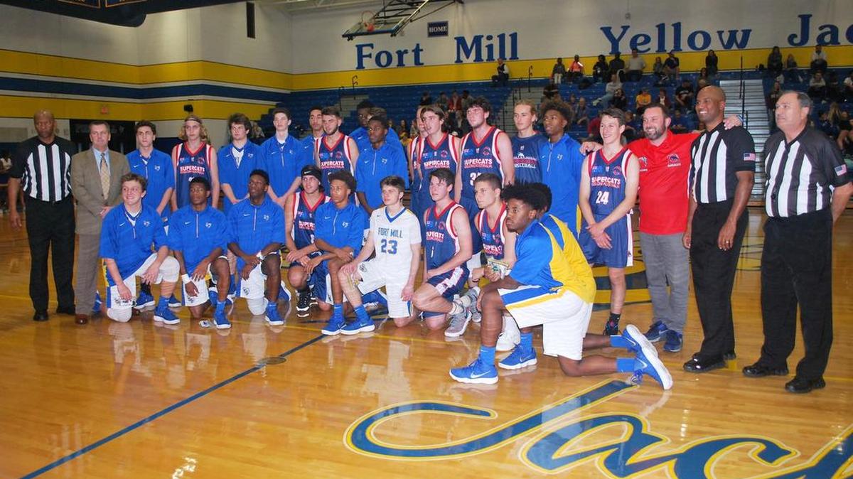 Fort Mill and the Geelong Supercats team gather for a group team photo together before recently playing at Fort Mill High.